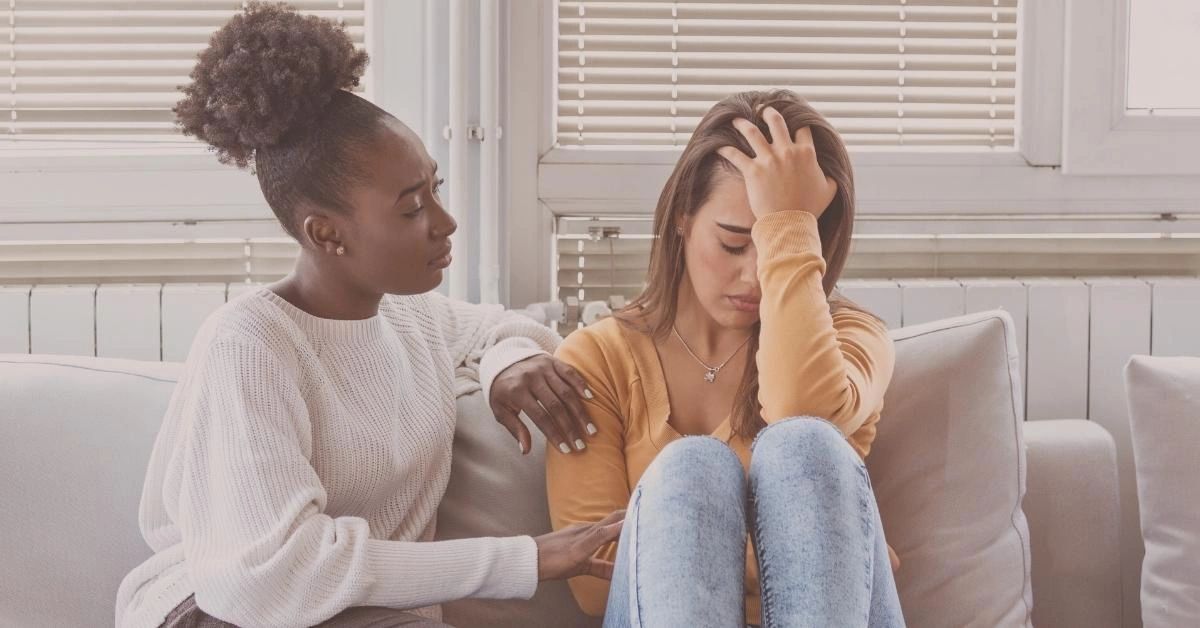 A young girl comforts her best friend while speaking about mental health.